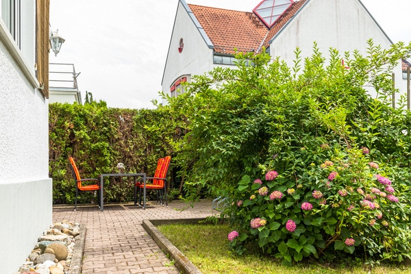 Ferienwohnung im EG: Erdgeschoss - Gartenbereich. Haus Christine am Vogelsang, Ferienwohnungen in Lindau am Bodensee.